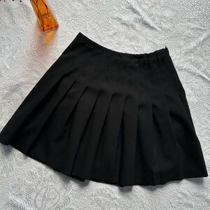 Black mini pleated skirt